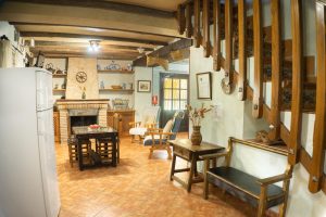 Salón con chimenea de Cortijo Las Chorreras